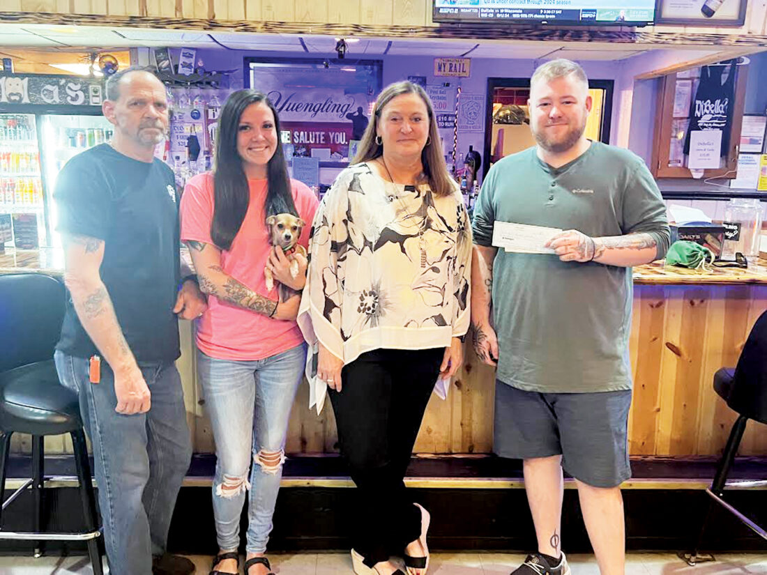 Business, band make a donation to Humane Society News, Sports, Jobs